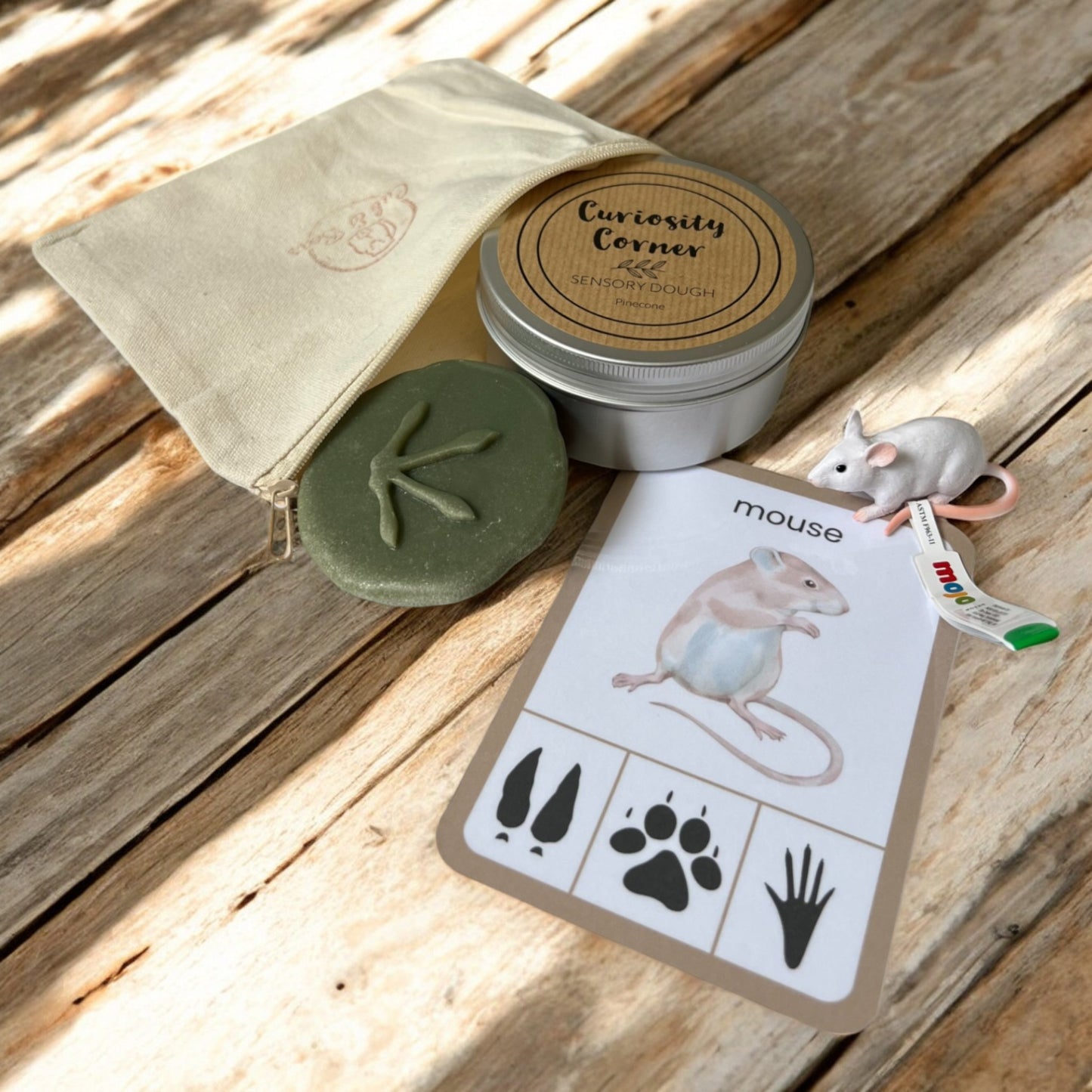 Cub & Bear Discovery Pouch containing Mojo Mouse, Curiosity Corner Dough, Yellow Door Let's Investigate stone, & PlayCraftGrow Flashcard